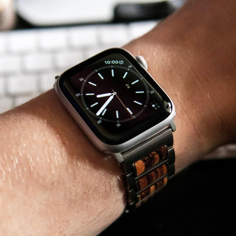 stainless steel wooden apple watch band on wrist