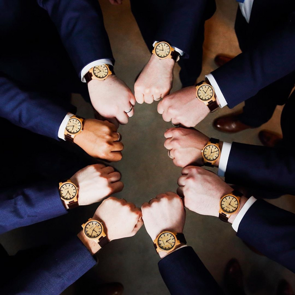 Groomsmen Wedding Party Hands In Center Making a Circle with Wooden Watches On