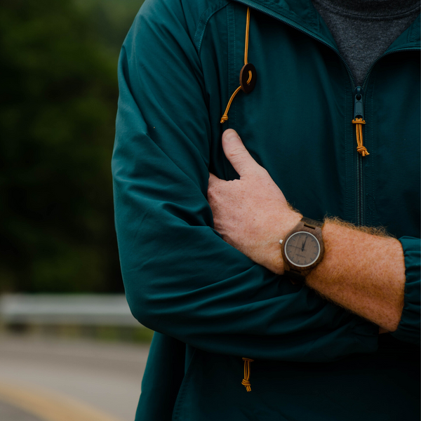 Man Crossing Arms with Wooden Watch on his wrist