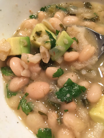 white bean chili with avocado cilantro and hemp hearts