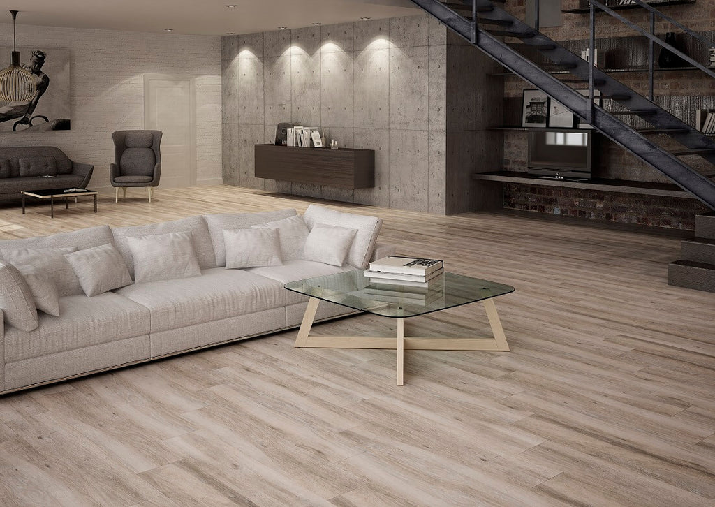 Atelier Taupe Wood Effect Tiles in Modern Living Room with Couches and Glass Coffee Table
