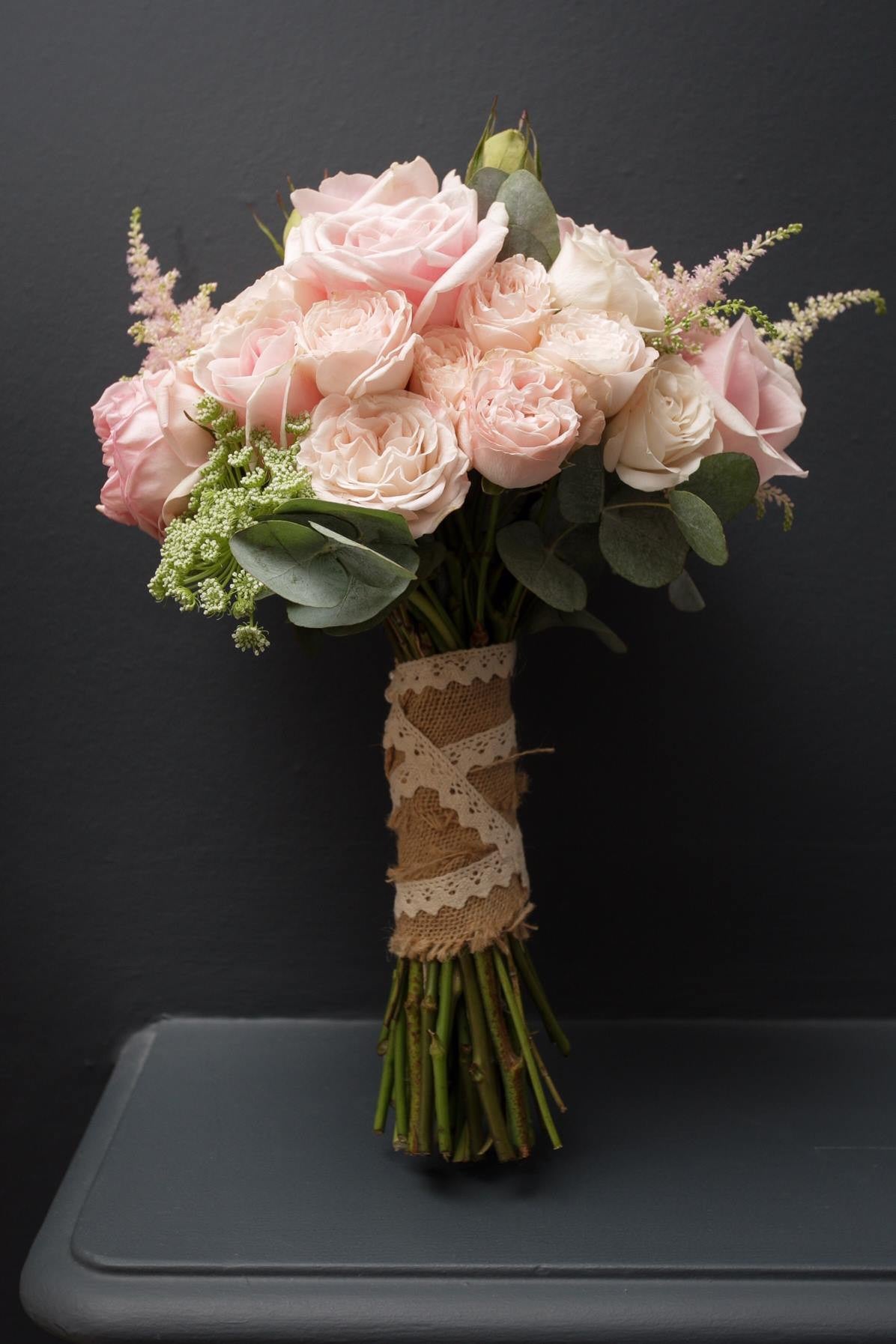 Classic bridal hand tied bouquet with pink Roses.