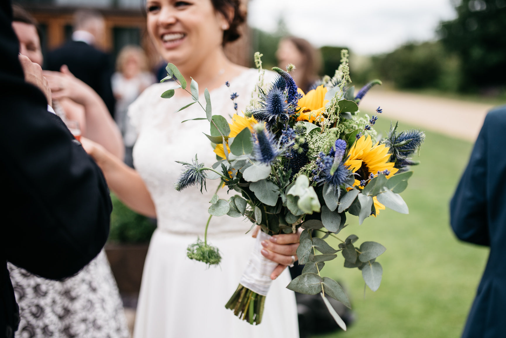 Bridal Bouquet with Sunflowers, Thistle and foliage