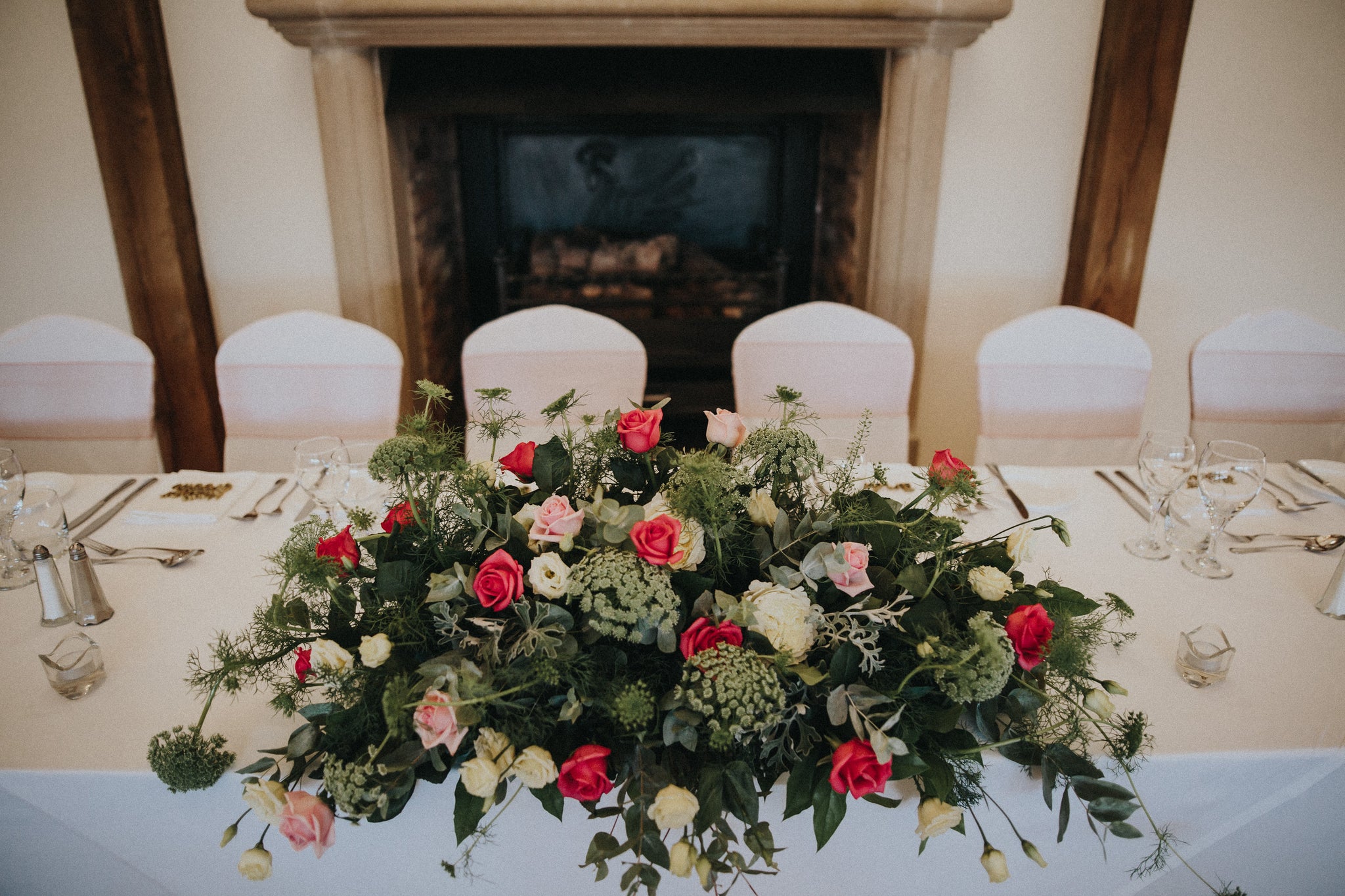 Pink and white Rose top table arrangement at Swancar Farm