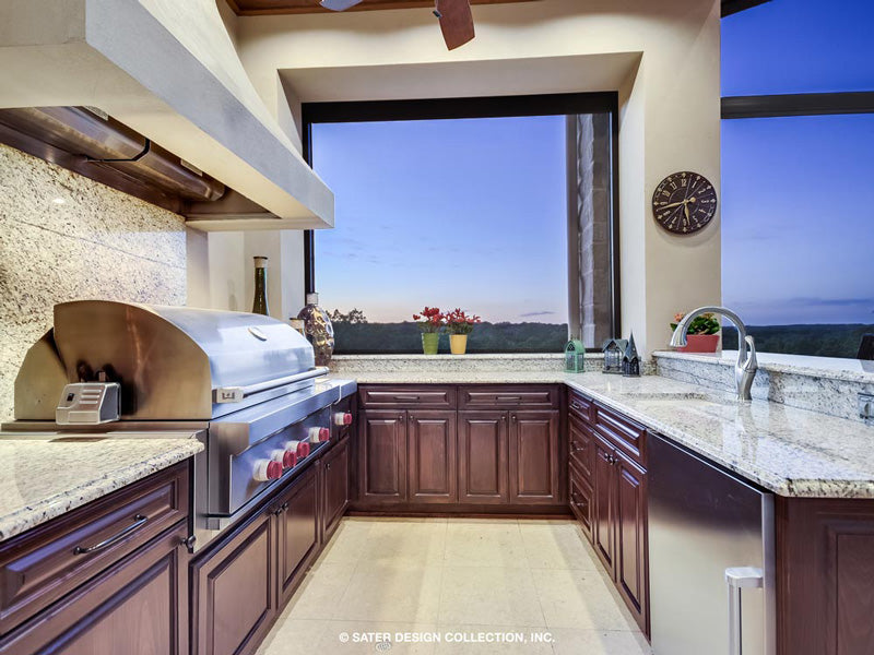 outdoor kitchen on the veranda of a custom home