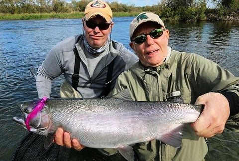 Father and Son Display a Great Catch
