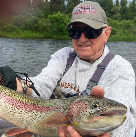 Giant Rainbow Trout Caught on Fly with a Dad Smiling Big