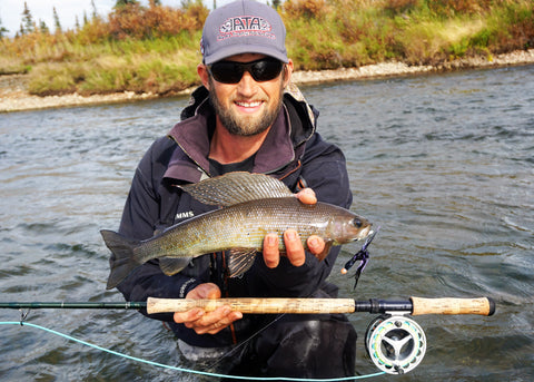 Fishing guide with Arctic Grayling catch