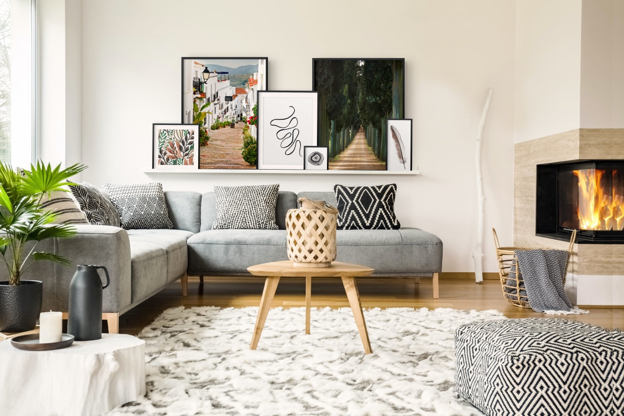 Living room with art on shelf above sofa