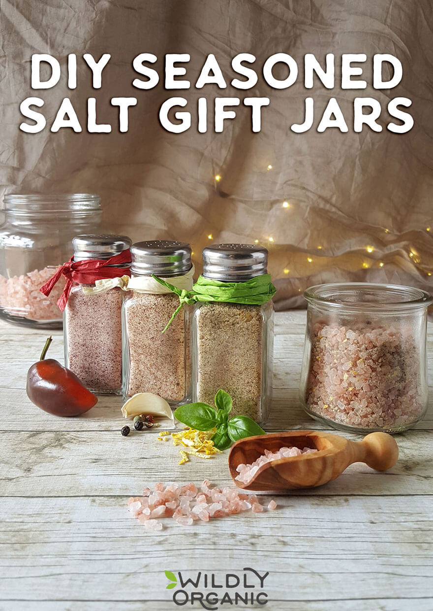 Photo of four salt shakers filled with different seasoned salts