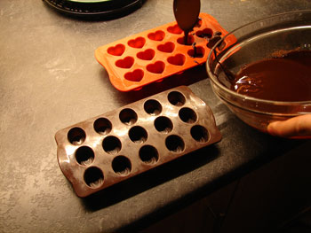 poring your chocolate mixture into the mould