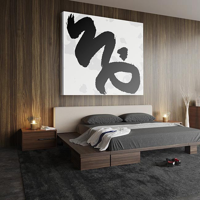 Black and white artwork on brown bedroom wall