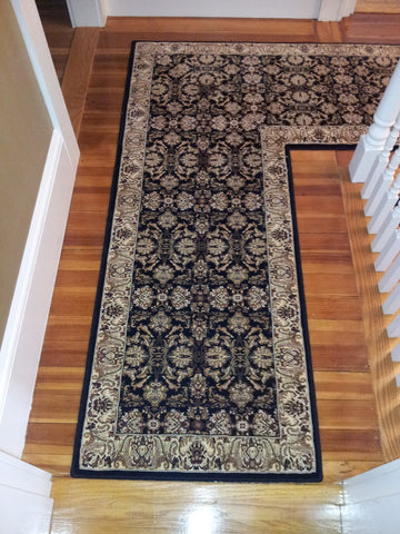 Couristan Himalaya Black Ivory 26 inch hall runner with a miter and an end cap