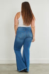 medium wash frayed hem flare jeans +