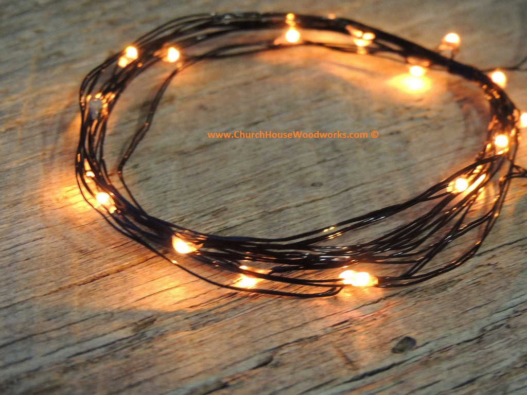 LED Fairy String Lights for rustic weddings wreaths mason jars orange light black wire Fall Halloween lights