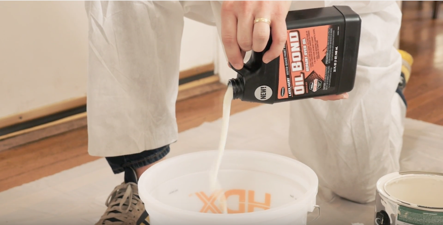 Professional Painter Mixes Oil Bond Into Latex Paint