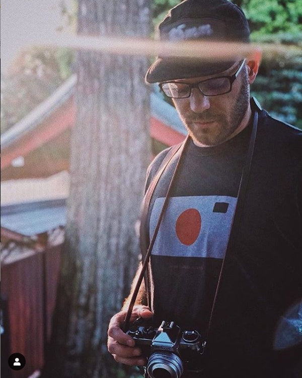 Japan Camera Hunter wearing the TogTees x JCH Tee