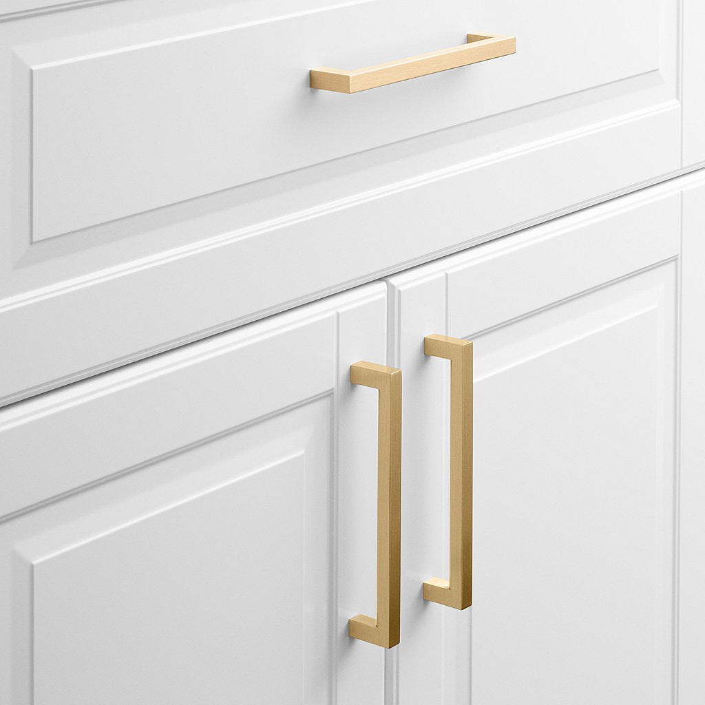 white cabinet doors with gold hardware