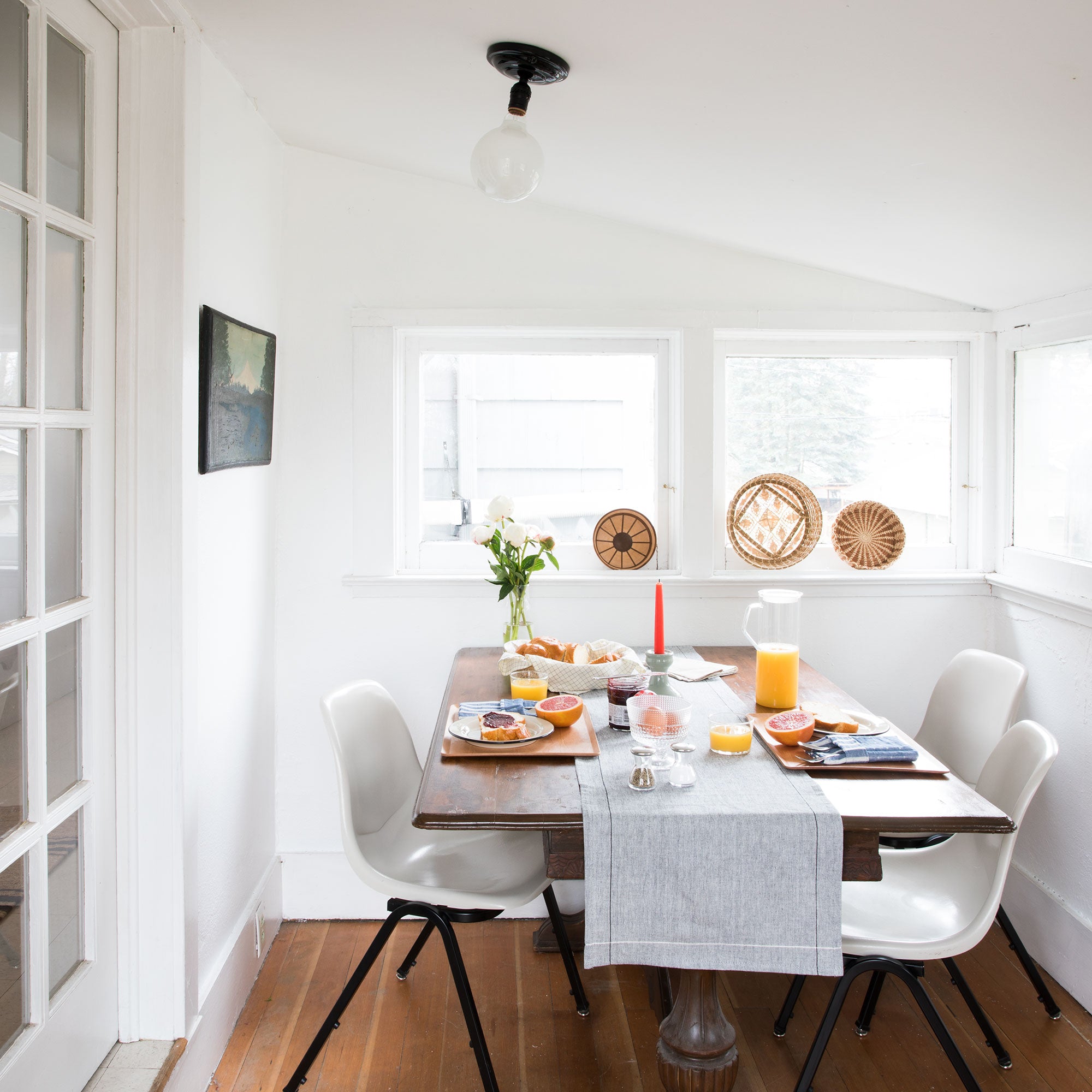 dining room with a table and chairs and drinks and food