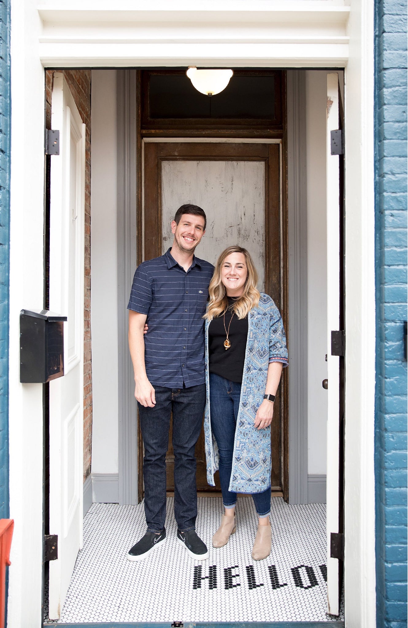 man and woman posing for a picture