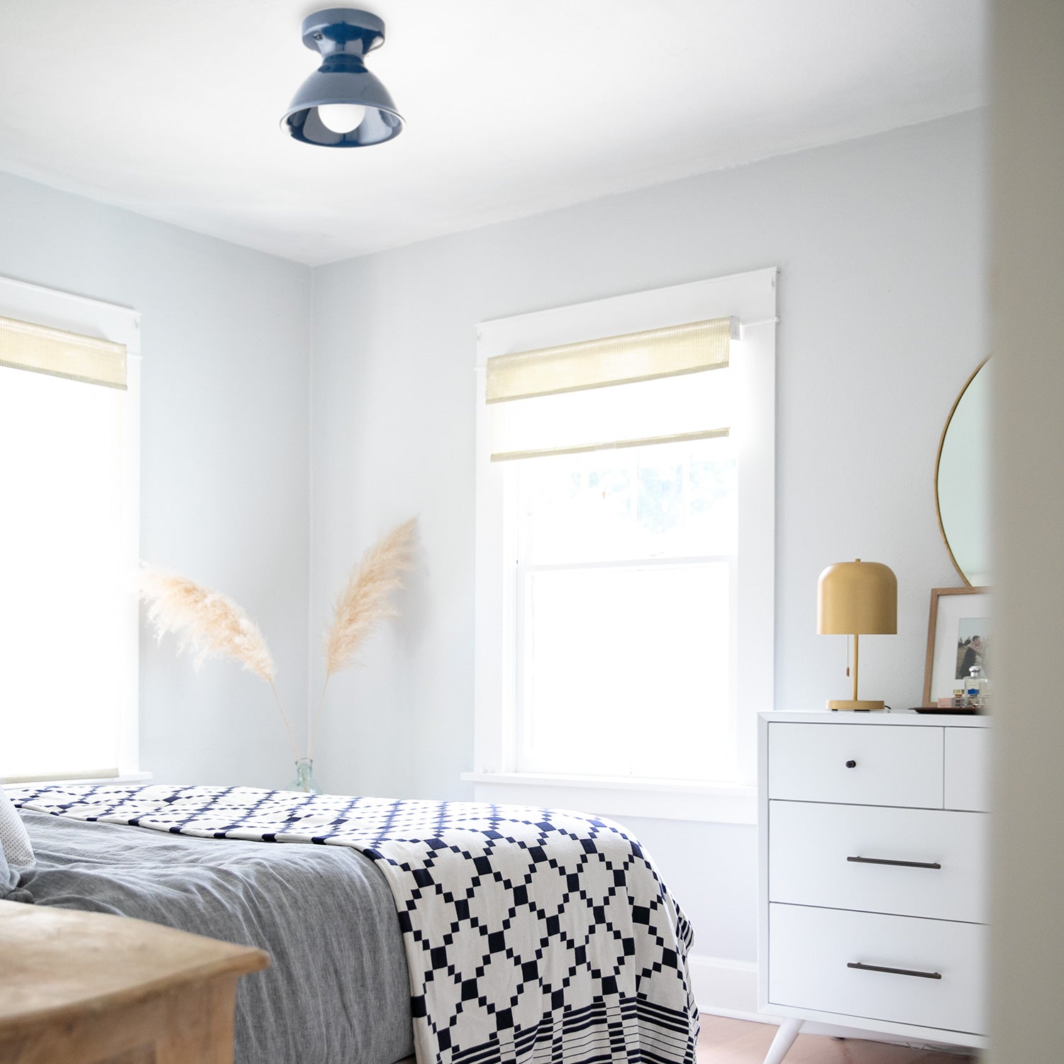 bedroom with a bed and a ceiling light fixture