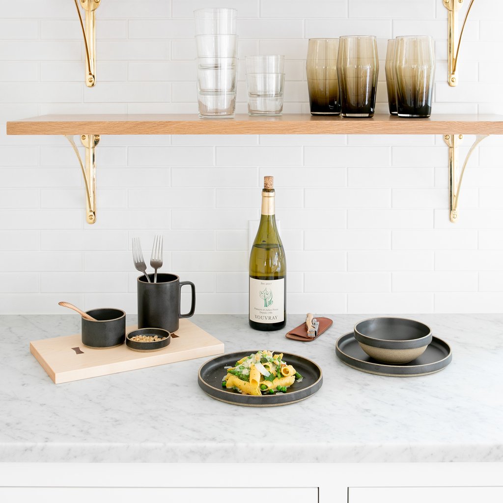 kitchen counter with a wine bottle and a glass bottle