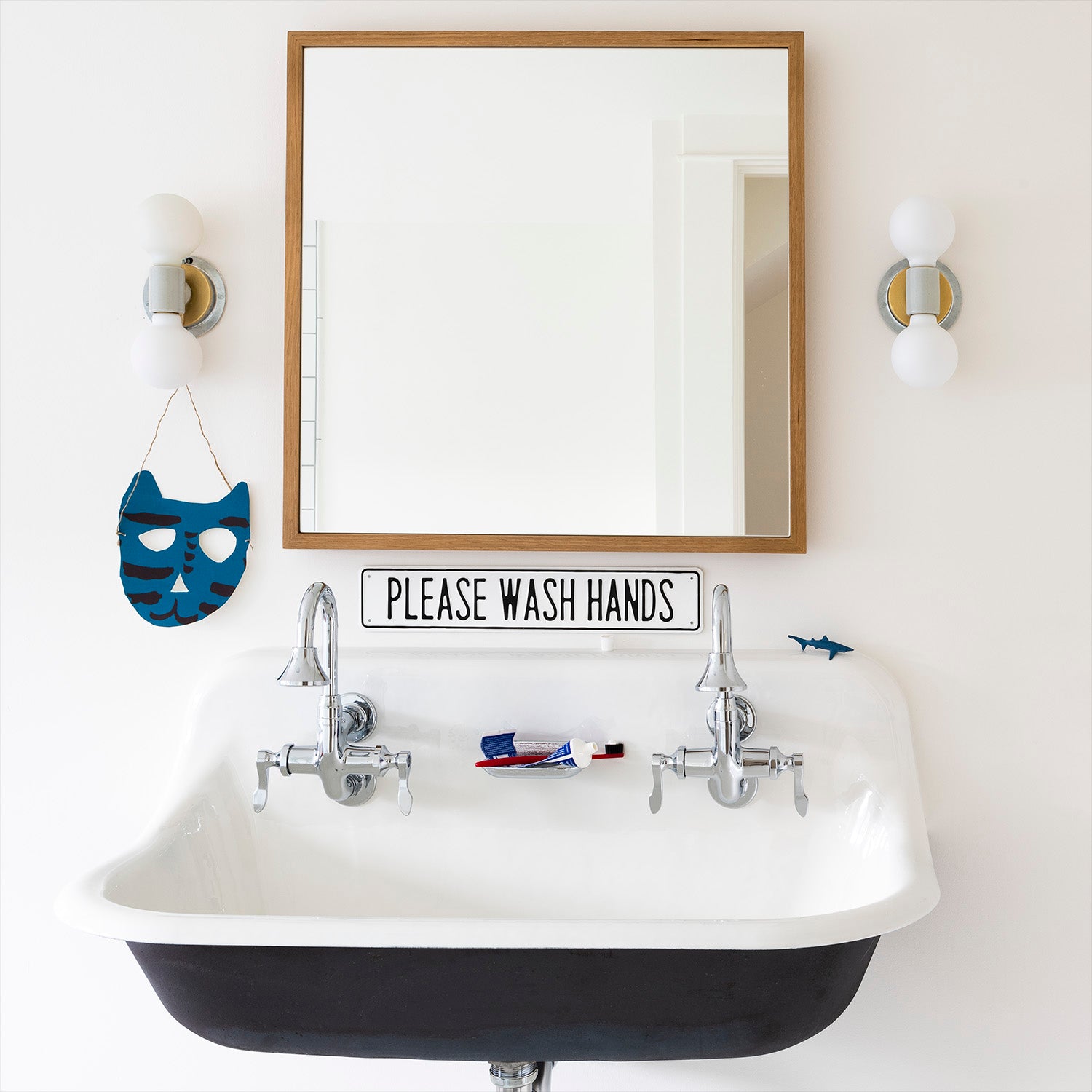 bathroom sink with a mirror above it
