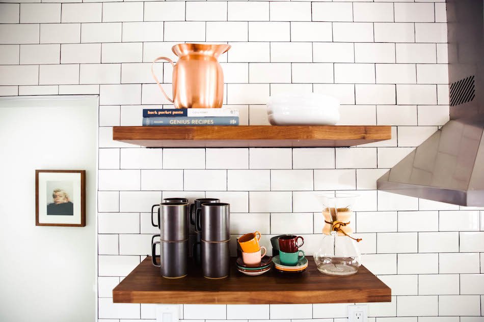 wooden shelves with cups on them