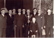 Jakie and the crew of the 'Unity' being presented with the Boothby Trophy