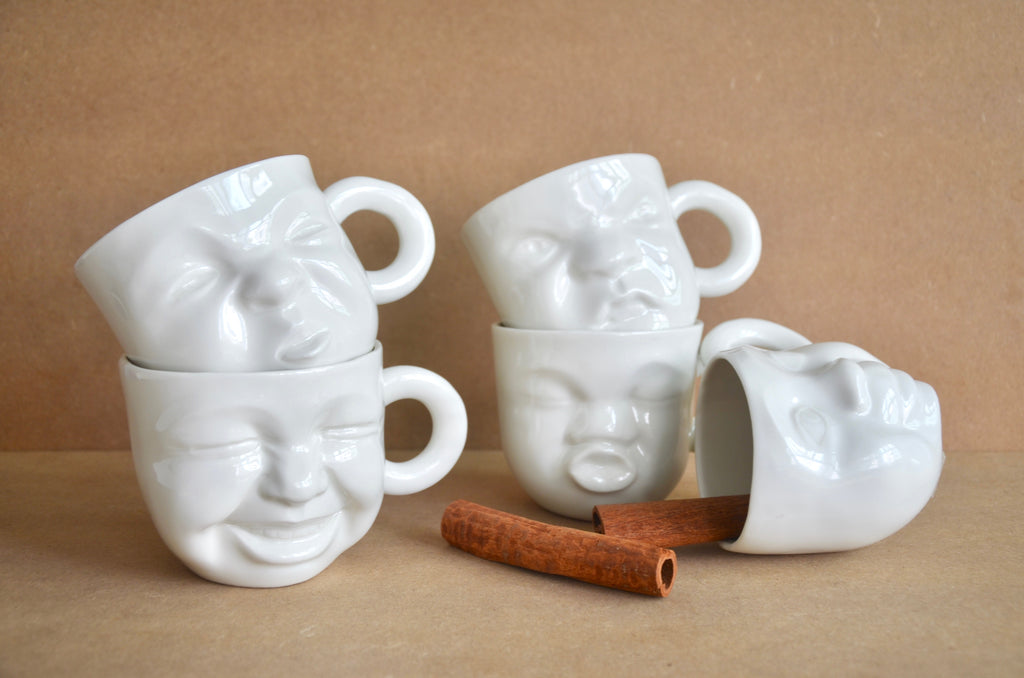 Handcrafted faces mugs | Singapore ceramics