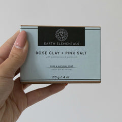 rose clay + pink salt soap bar in hand