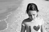 Girl Walking on The Beach