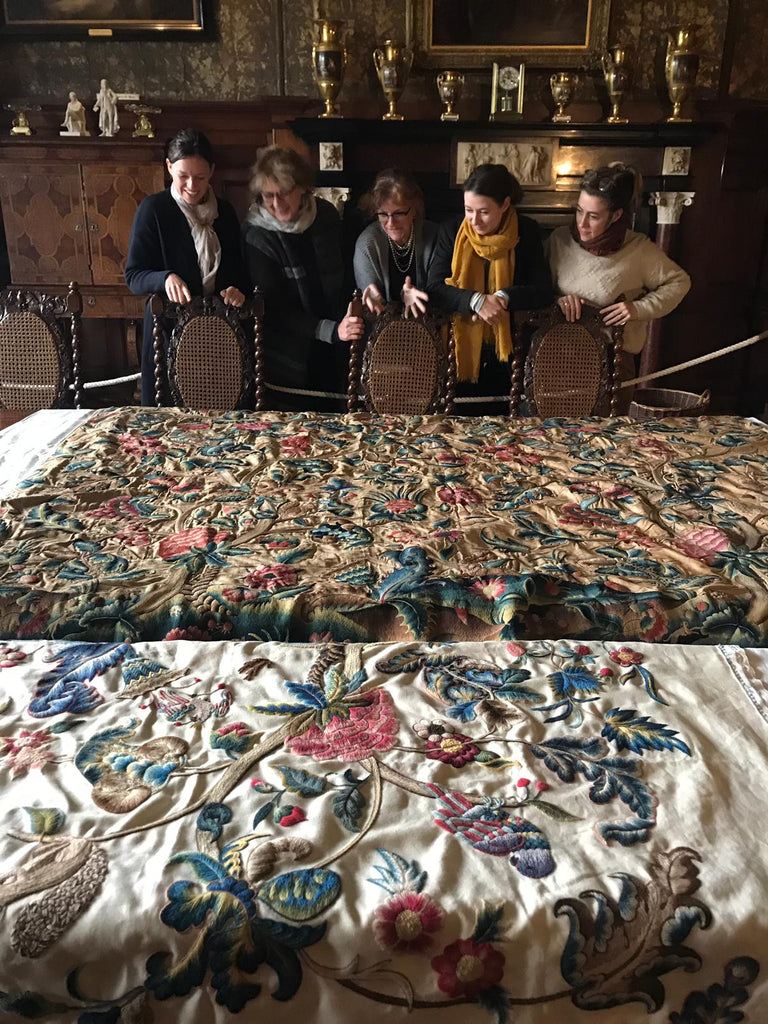 The team viewing the original Muncaster Bed Hanging with the replica