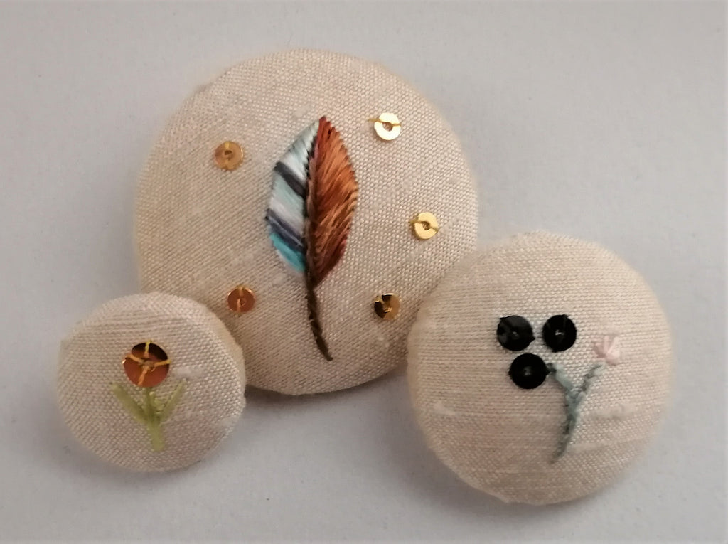 Silk embroidered buttons by Mandy Ewing