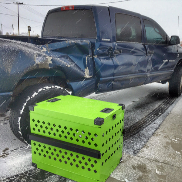 green collapsible impact dog crate involved in car crash