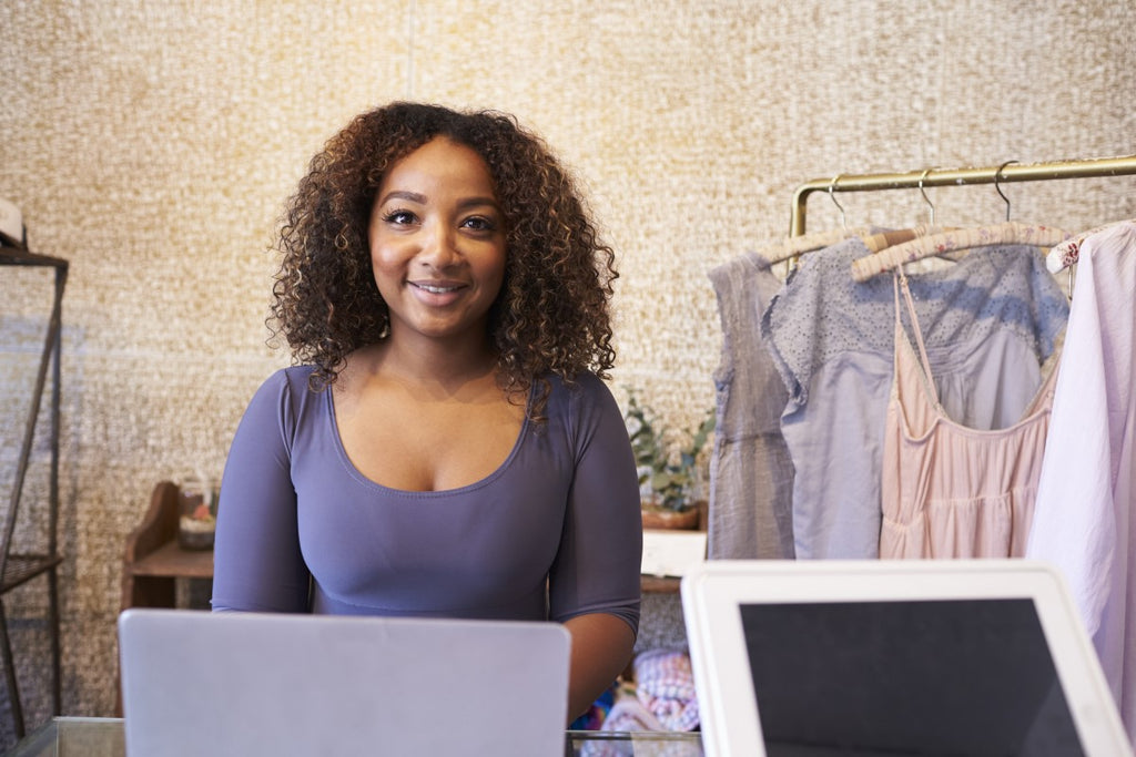 Vegan customer talks to consignment shop owner about clothes