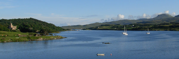 Loch Dunvegan with castle and MacLeod's Tables