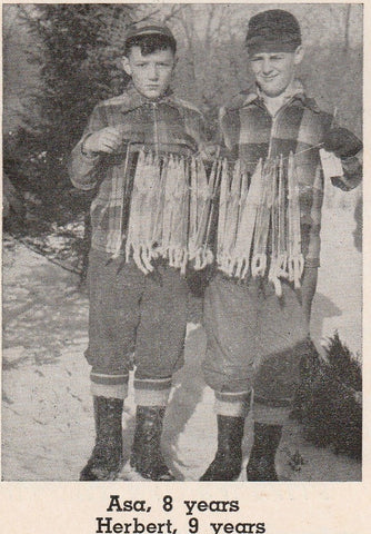 Asa and Herb Lenon Showing Weasels Trapped in Michigan