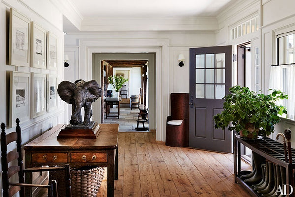 Entry way with antique and vintage pieces by Mark Cunningham