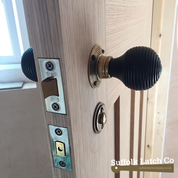 Beehive door knob and architectural tubular latch
