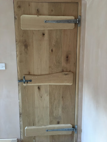 custom made door with pewter hinges and latch