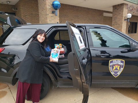 Linda "Stuffing the Squad Car" at Wixom Police Department - Near Our Headquarters