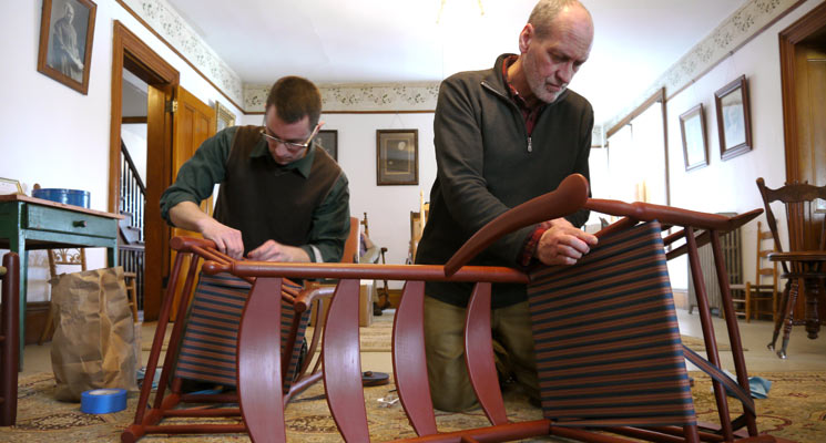 Adam Nudd-Homeyer and Brother Arnold Hadd weaving seats on the Alfred Chairs. Photo: United Society of Shakers