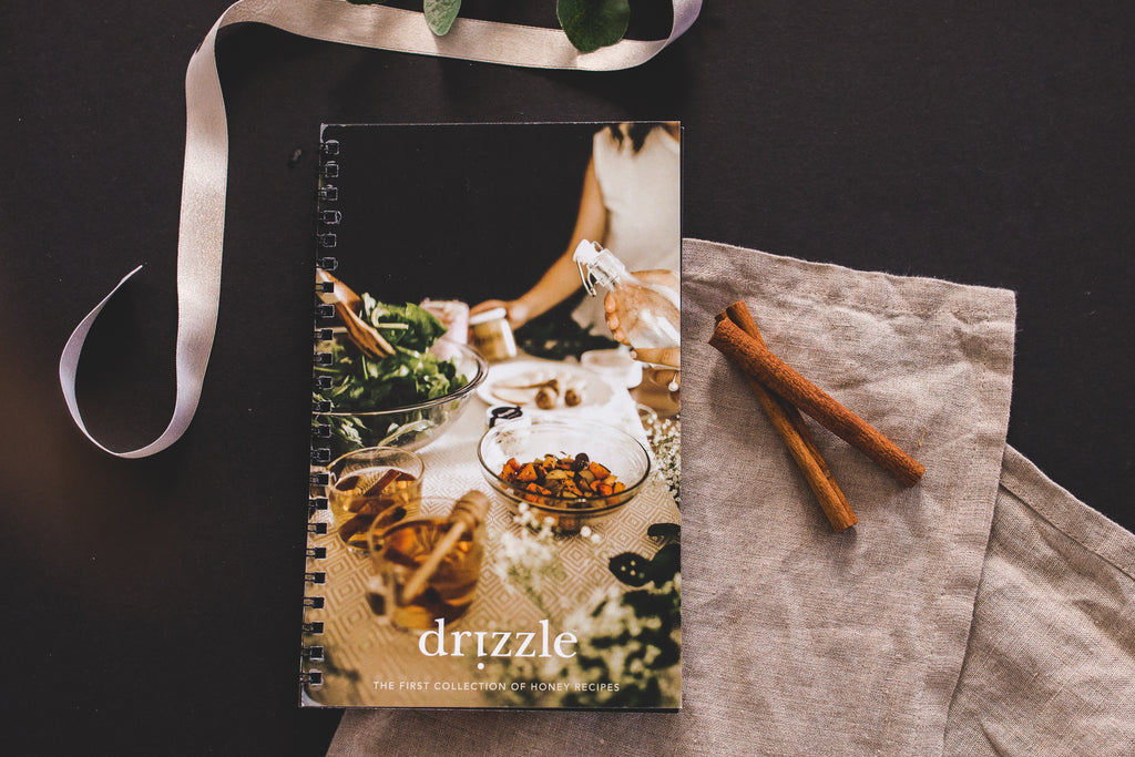 First edition Drizzle Honey Recipe Book laid on a table