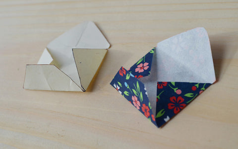 Folding homemade Valentine's envelopes
