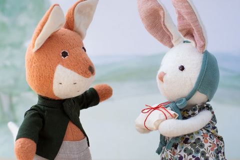 Owen Fox receives a gift from Penelope Rabbit