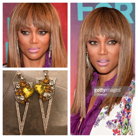 Tyra Banks Wearing Canary Yellow Spike Earrings