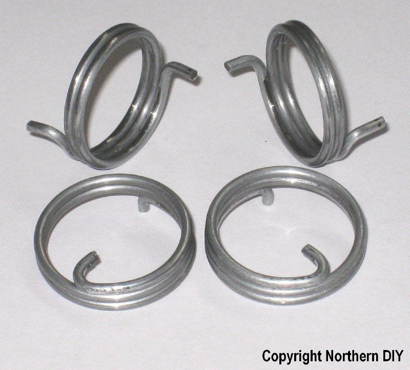 Round Wire Door Handle Spring coils with arms in different positions