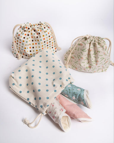 Close up of hannahpads and their storage bags
