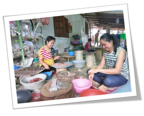 Thai metal artisans working on keepsake gifts 